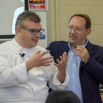 Santodonato and Giacomo Berselli, president of Marco Polo Study Abroad, explain a cooking method during a demonstration and tasting for students.
