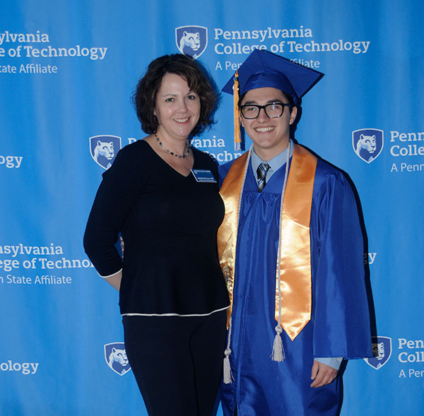 Accustomed to shepherding thousands of students along the road to graduation, Jennifer McLean – associate dean of student affairs – celebrates with her son. Patrick McLean Bowes, who will continue his education at Penn State in the fall, earned an associate degree in business management (with high honors).