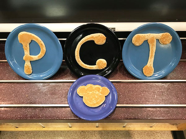 Batter up? Custom-made pancakes say it all, punctuated by a paw print.