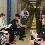 Yaw listens as opponents of legalizing marijuana refine their position during a breakout discussion in the Breuder Advanced Technology & Health Sciences Center. Guiding them through the process are some of the seminar's many knowledgeable facilitators (counterclockwise from bottom right): state Sen. Kristin Phillips-Hill (R-York); Fred R. Strathmeyer Jr., the state Department of Agriculture's deputy secretary for plant industry and consumer protection; and Fred Sembach, chief of staff to state Sen. Mike Folmer (R-Lebanon).
