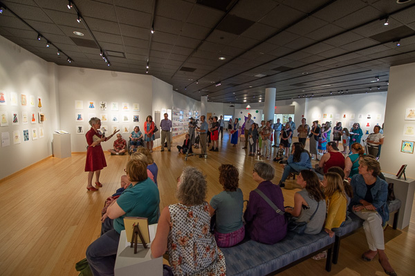 The gallery audience is attentive to Cawley’s insights. More than 130 individuals visited The Gallery at Penn College on Thursday evening. 