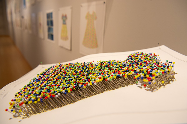 Artist Eli Sobel’s dress is more pin than print!