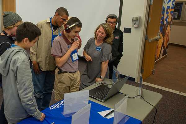 ASPIE students delight in speech recognition software at an assistive technology session led by Dawn M. Dickey (second from left), assistant director of disability services.