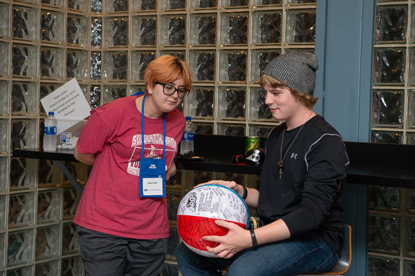 A popular ice-breaker on campus: a beach ball covered in questions engages guests.