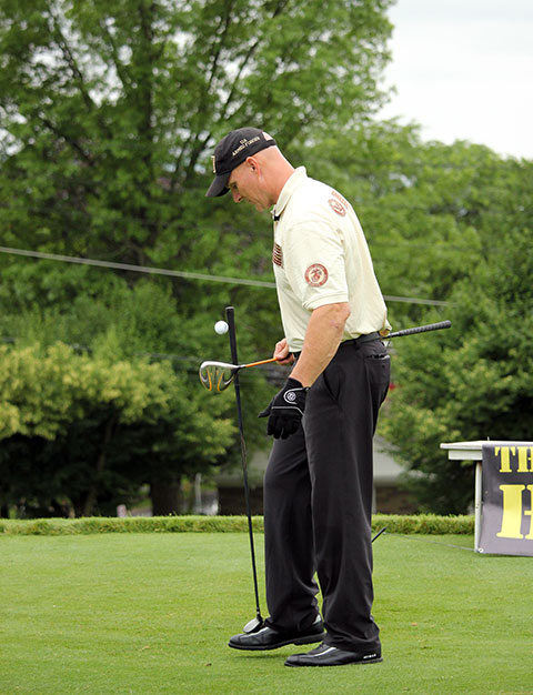 Hiter bounces a ball of the clubhead in one of his time-honed skills.