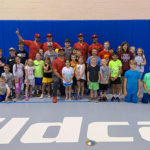 ... and pose for a parting shot with campers.