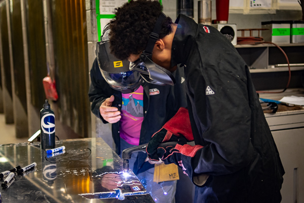 The Lycoming Engine Metal Trades Center hosted young welders, clad in proper safety equipment ...