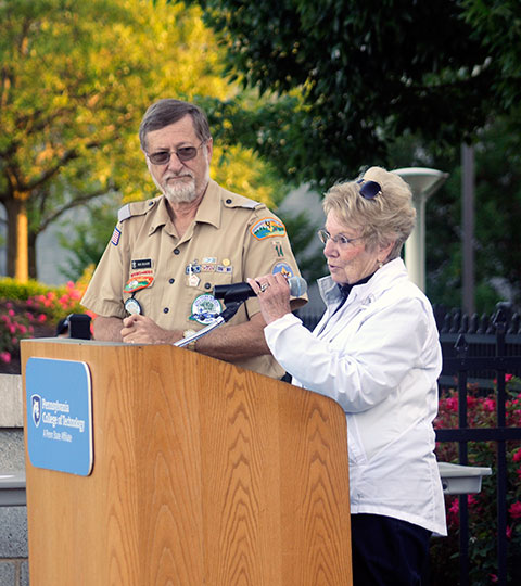 DiSalvo's widow, Kathleen, expresses her family's gratitude – and urges everyone to return next year. With her is Scouting's Bob Weaver, chair of the march.