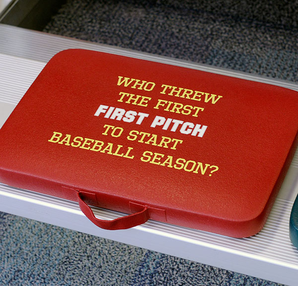 The Smithsonian's contribution includes such interactive exhibits as trivia questions on stadium seat cushions ...