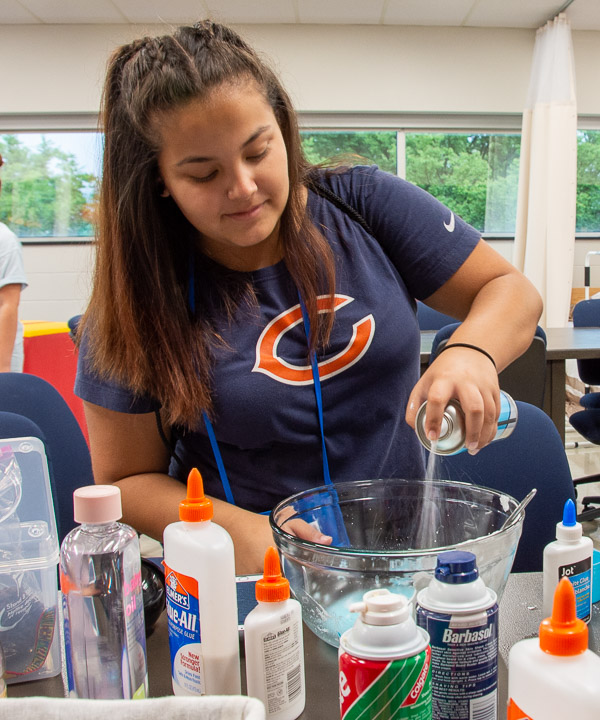 In the occupational therapy assistant Lab, a participant makes slime, which has a variety of therapeutic uses.