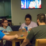 Natascha G. Santaella (center), a Connections Link (and applied management major) from Puerto Rico, places the safest bet of the summer: that incoming students will return home more prepared for their first semester at Penn College.
