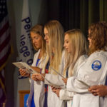 Students Breica N. Beck, of Mountville; Danielle N. Bilger, of Hollidaysburg; Brielle N. Blanchard, of Towanda, and Cera N. Blunk, of Schuylkill Haven, recite the Physician Assistant Oath.
