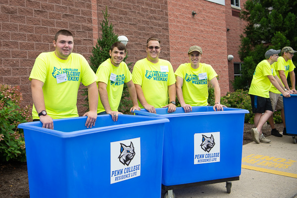 Move-in volunteers represent a range of majors (from left): Derek P. August, information technology: network specialist concentration; Brandon T. Hostetlar, building construction technology; Daniel T. Wright, engineering design technology; and Christopher D. Hogan, welding and fabrication engineering technology. 