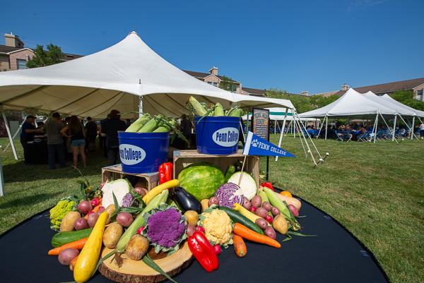 A beautiful display of summer's bounty – colorfully created by Mark J. Leo, director of dining services – greets families at the picnic tents.