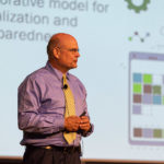 The speaker points to New Kensington's collaborative approach as a workable revitalization model for the Penn College community.