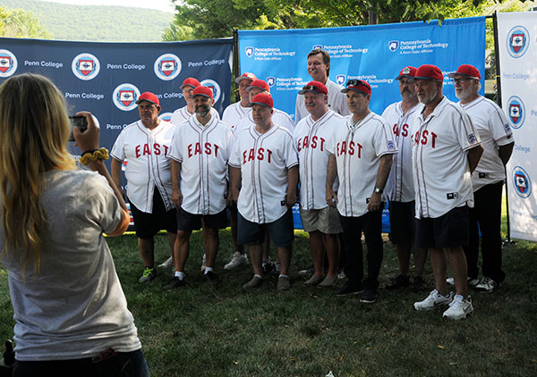 Members of the 1969 Newberry Little League team, minus only one player since they played in the Series a half-century ago, are photographed with the Hall of Famer. Behind the cellphone camera is student Emily K. Conklin ...
