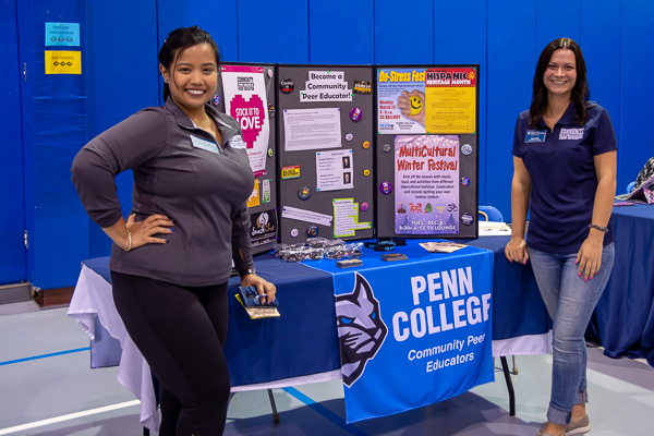 Community Peer Educators Dessa D. Valisno (left), a business administration: marketing concentration student from Lock Haven, and Alexis R. Price, an applied human services major from Huntingdon, exude positivity in their recruitment of student leaders.
