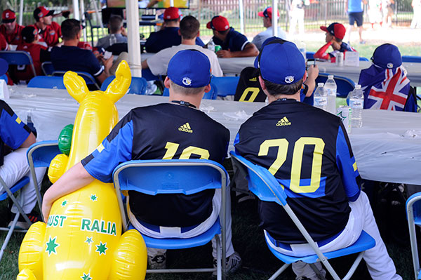 When you're 9,781 miles from your Sydney, New South Wales, home, it helps to enlist the comfort of a trusted mascot. These Australian guests enjoy a replay of last year's Series final with their equally attentive friend.