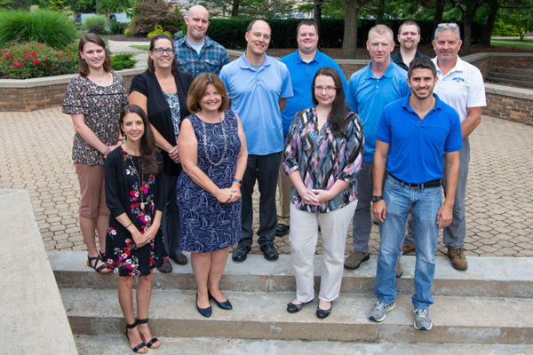 Among new faculty and librarians are: (front row from left) Scanlon, Motel, Campbell and Turnbach; and (back row from left) Waugh, Warner, Wolfe, Suzadail, Bell, Nagy, Marconnet and Warren. Not pictured are Shelinski, Starkey and Weaver.