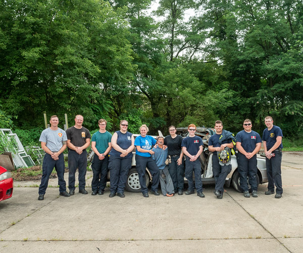 Paramedic students with their fire department mentors – and a newly rescued “patient.”