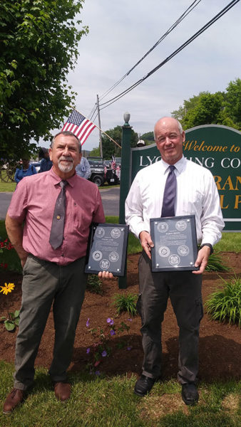 Instructors Glenn R. Luse (left) and Harry W. Hintz Jr., were honored in the spring for their "dedication, expertise, leadership and commitment" to the project.