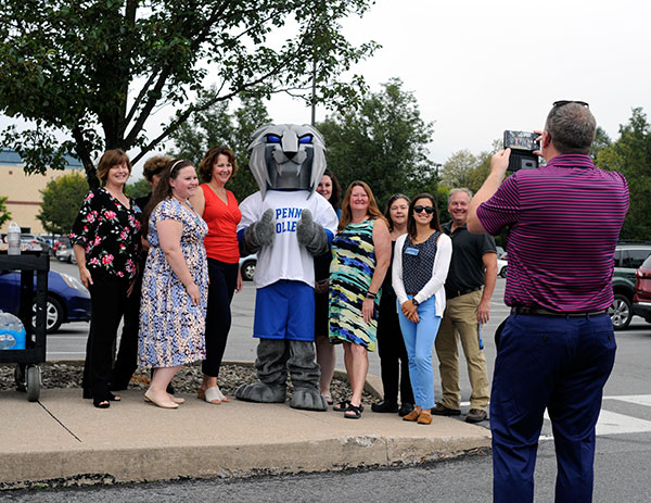 An A-Team of co-workers from various Student Affairs offices, stationed near the Carl Building Technologies Center, is photographed Monday morning by VP Strickland.