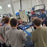 Maloney, a member of the college's Collision Repair Advisory Committee, gets up close and professional in his demo ...