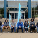 Celebrating their tag-team tinting of the Veterans' Fountain are (from left) SGA's Downes, Michael E. Highland II, Patrick C. Ferguson and Ryan P. Farabaugh; and WEB's Jerry J. Hudak, McKenna N. Myers, Shaqira S. Drummond, Serena V. Bergeron and Chad M. Karper.