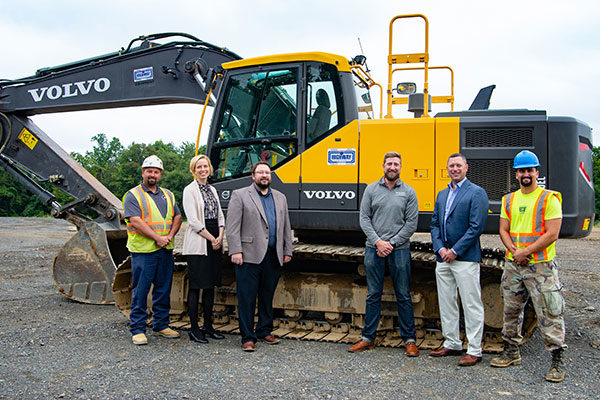 Gathered around a Volvo EC220 excavator on loan for Pennsylvania College of Technology students’ use are (from left) Ryan W. Peck, diesel equipment technology instructor; Elizabeth A. Biddle, director of corporate relations at the college; Justin W. Beishline, assistant dean of transportation and natural resources technologies; Tyler Wright, remarketing sales manager for Volvo Construction Equipment; Ryan Flood, vice president, Highway Equipment & Supply Co.; and Jonathan G. Vasconcelos, of Windham, N.H., enrolled in heavy construction equipment technology: technician emphasis. (Photo by Cindy Davis Meixel, writer/photo editor)