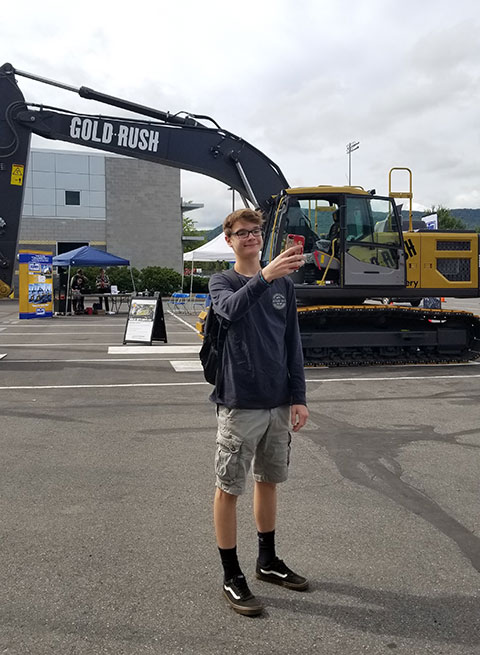 Nick J. Marouchoc, a welding technology student from Hellertown, snaps a selfie with a larger-than-life celebrity visitor.