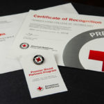 A certificate and pin affirm Penn College's credentials as a Red Cross Premier Blood Partner.