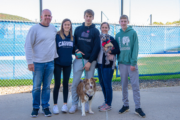 Because he misses the dogs, Brandon D. Hopwood Jr.’s family brought them along to Parent & Family Weekend! Hopwood (at center), of Collegeville, is a freshman in human services and restorative justice. 