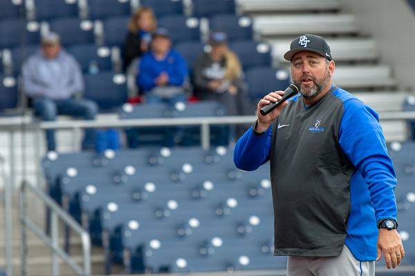 Coach Howard welcomes visitors to the exhibition game and acknowledges that one of the teams is sporting black jerseys, but that the name – “The Blue and White Classic” – remains a tradition.