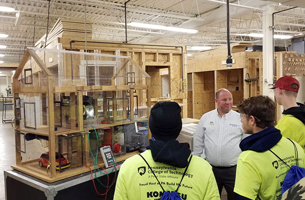 Among the knowledgeable college employees on hand is Franklin D. Gillis, construction/building science instructional specialist at the National Sustainable Structures Center.