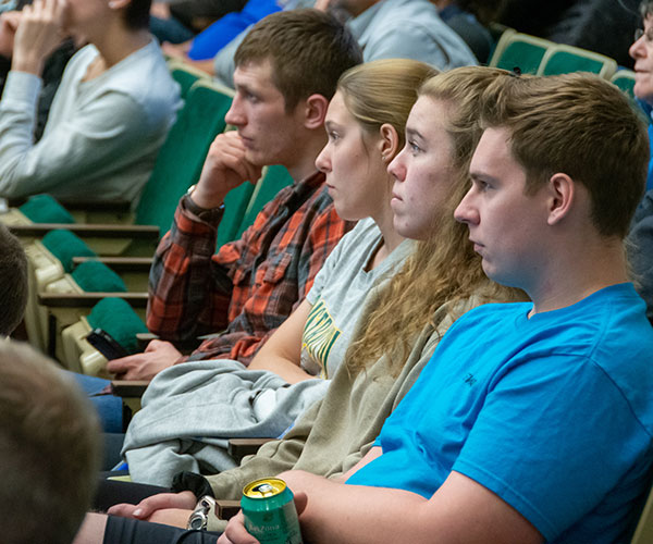 Engaged students fill the audience of nearly 200.