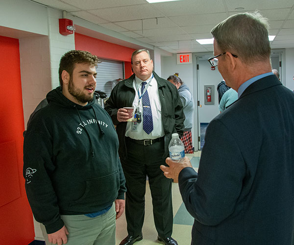 Students and employees alike listen to the scholar’s insight during a post-lecture opportunity for conversation in Wrapture. 
