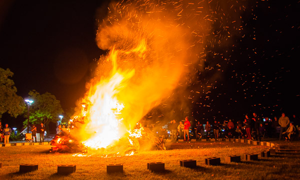 A welcome sight on a crisp fall night, a bonfire beckons weekend attendees.