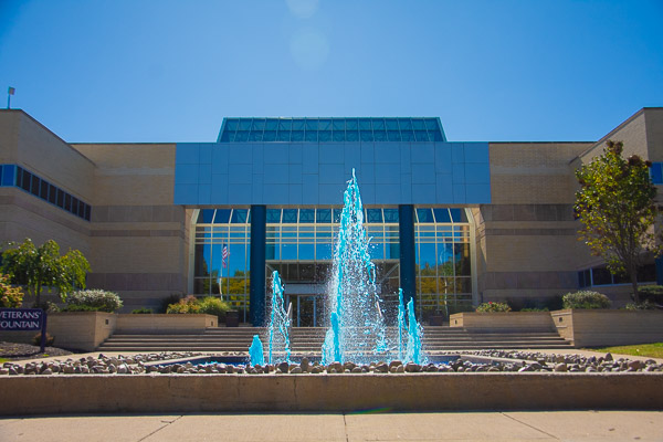 In a Homecoming tradition that will continue through Open House on the final Sunday of the month, the Veterans' Fountain sends up a plume of blue.