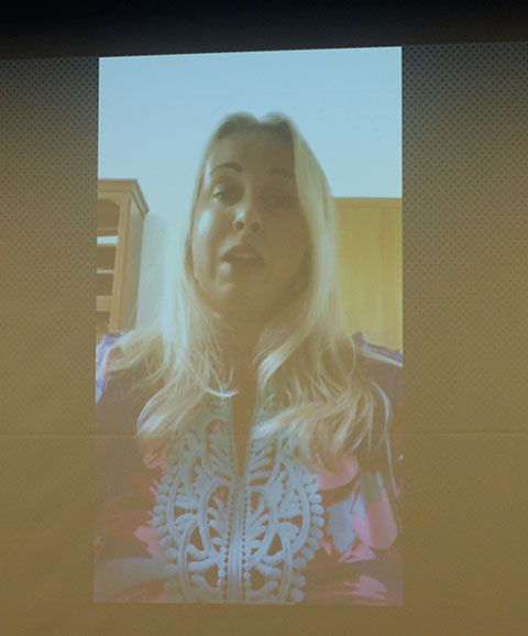 ... while their daughter, working in Romania, delivers her gratitude via video.
