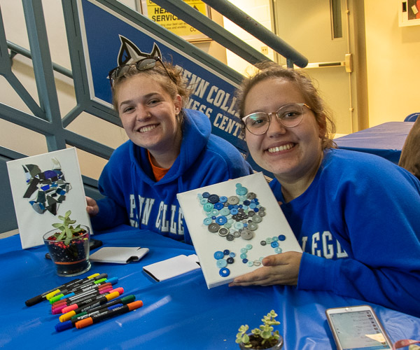 Allyson K. Bigler, an aviation maintenance technology student from Stewartstown, and Abby G. Seebold, a pre-nursing student from New Columbia, show off their work.