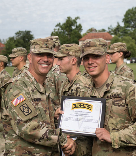 Penn College Army ROTC cadet Austin S. Weinrich (right), of Jenkintown, receives the RECONDO badge for displaying superior skills at Advanced Camp. Held at Fort Knox, Ky., Advanced Camp is considered ROTC’s most significant training experience. Weinrich was one of 14 cadets out of approximately 600 in the 4th Regiment to receive the RECONDO Badge. Presenting the RECONDO badge is Brig. Gen. Antonio V. Munera. 