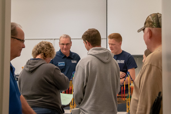 Brad H. Lyon (second from left), an assistant professor of civil engineering technology, exemplifies the substantial college faculty with technical experience to match their academic background.