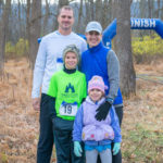 Family fun for four! Eric C. Easton, forestry instructor, and his family braved the brisk November morning to run the 5K together. (Mom Carolyn won her age group.)