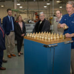 John M. Good III, instructor of automation and computer integrated manufacturing, leads a tour in College Avenue Labs.