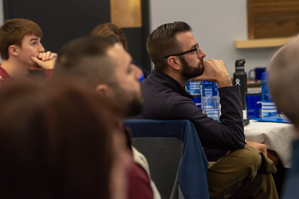 Intent listening by attendees, including Penn College alumnus Orion Behrer (right), human resources manager at West Pharmaceutical Services