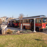 Educators board trolleys to visit the Schneebeli Earth Science Center and the Lumley Aviation Center. Tours were available in each of the college’s six academic schools.