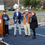 Lugg and Reed accept plaques on behalf of the college's role in the veterans memorial.