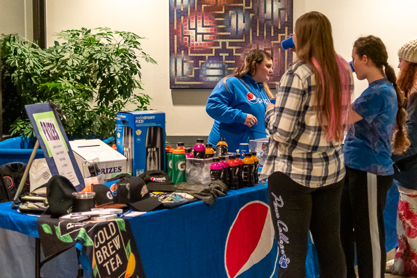 The Pepsi table provides student refreshment, prizes and product sampling.