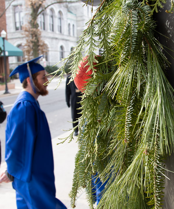 Greenery greets grads as they enter the Community Arts Center.