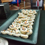 With diets moot until the new year, cake pops and cookies tempt attendees. 